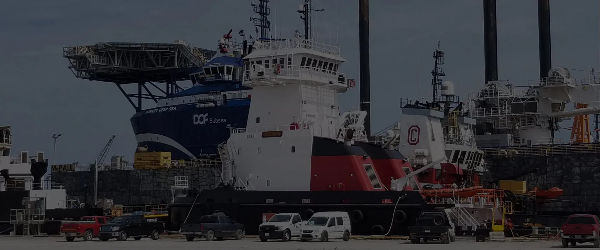 Offshore supply vessels moored at an industrial port